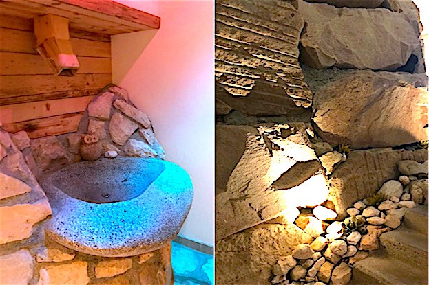 Bachsteine als Waschbecken und eine Kneipptreppe im Wellness-Bereich